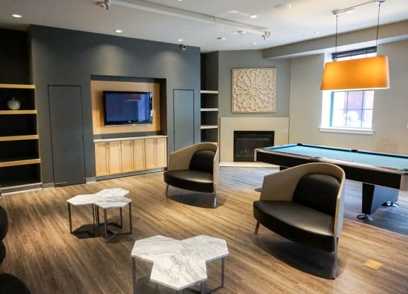 Community Clubroom with Pool Table and Sitting Area. at Haverhill Lofts, Haverhill, 01830