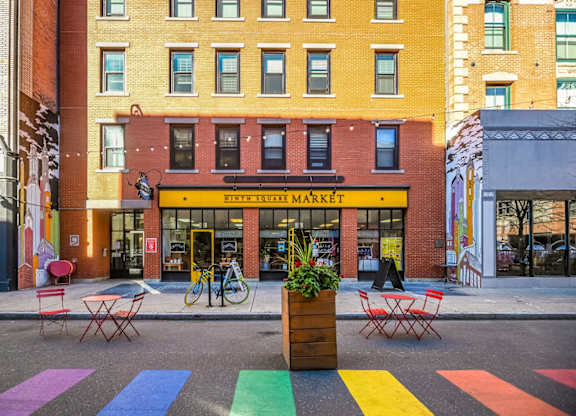 a crosswalk in front of a store on a city street at Ninth Square Apartments, New Haven, CT