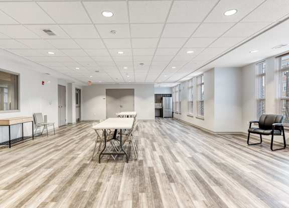 Resident Community Room With Seating and Kitchen at Niagara Square, Buffalo, 14201