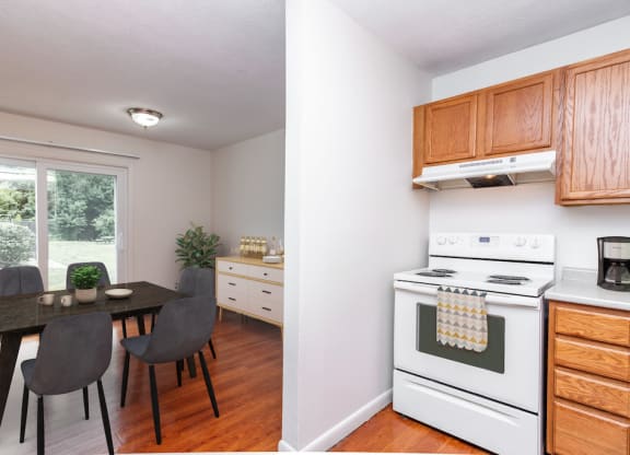 Fully Applianced Kitchen and Dining Room at Rolling Green Apartments, Massachusetts, 01002