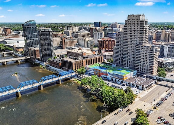 A cityscape with a river running through it.