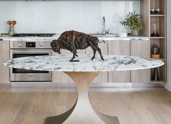 a living room with a table with a tiger on it