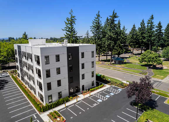 A large white building at The Hub Apartments, Washington