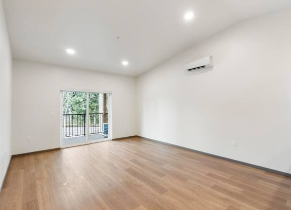 empty room with hard wood floors.
