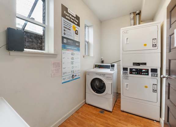 A laundry room with a washer and dryer.