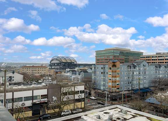 A cityscape with buildings and a clear sky.