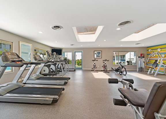 A spacious gym with treadmills, exercise bikes, and other equipment.at Hills at Hacienda Heights, Hacienda Heights