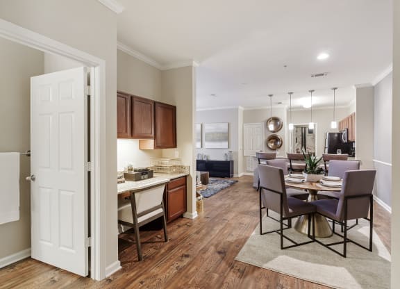 a living room and dining room at Cumberland Place Apartment Homes, Tyler, TX