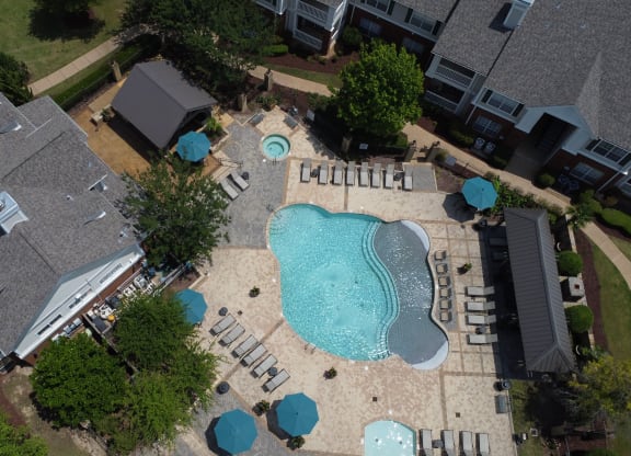 an aerial view of a pool at Legacy Apartments in Ridgeland, MS