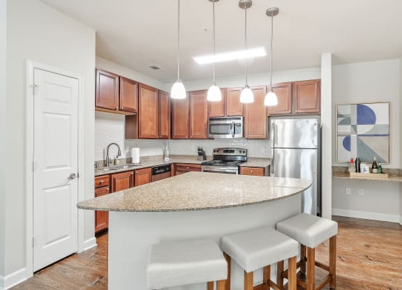 Efficient Appliances In Kitchen with pendant lighting at Faulkner Flats Apartment Homes, Oxford, MS, Mississippi