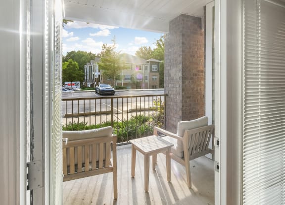 Private Balcony With Seating at Faulkner Flats Apartment Homes, Oxford, 38655