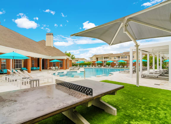 ping pong table and pool at The Vineyard of Olive Branch Apartment Homes, Olive Branch, Mississippi