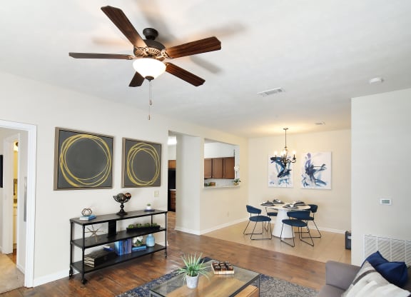 a living room with a ceiling fan and a dining room at Landing at Willow Bayou in Louisiana 71111