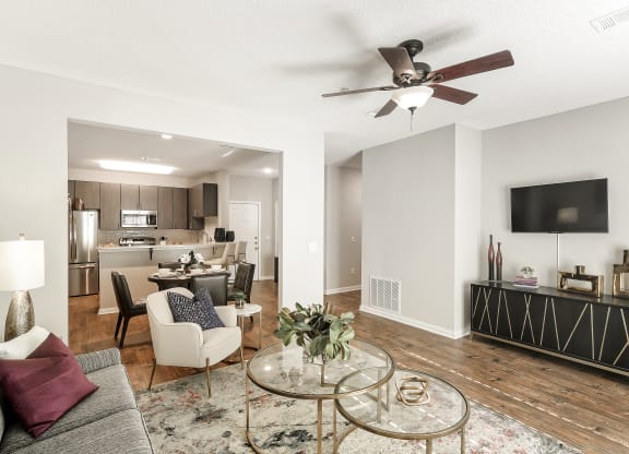Stylish Tv Cabinet In Living Room at Lagniappe of Biloxi Apartment Homes, Biloxi, MS, 39532