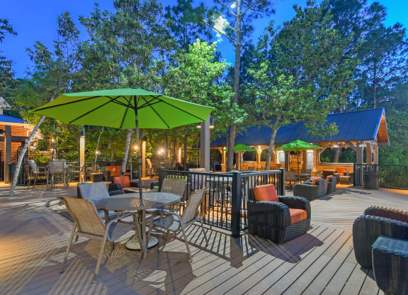 Outdoor resort type patio  at Lagniappe of Biloxi Apartment Homes, Biloxi, 39532