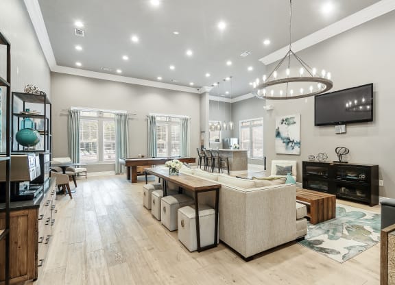 a living room with a couch and a table at Charleston Apartment Homes, Mobile, Alabama