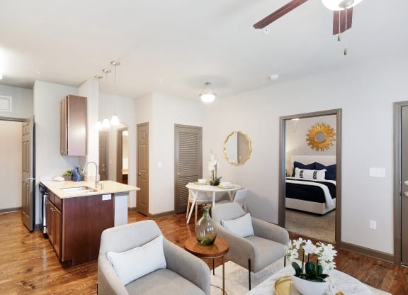 Living room and kitchen with a bedroom at Kingston Crossing Apartment Homes, Bossier City, LA, Louisiana  , 71111