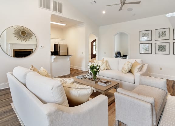 a living room with couches and chairs and a coffee table at Summit of Shreveport Apartments, Shreveport, 71105