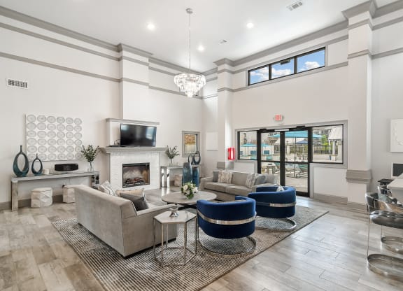 living room with couches and a fireplace at Parkwest Apartment Homes, Hattiesburg, 39402