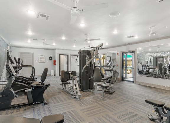 a gym with treadmills  at Parkwest Apartment Homes, Hattiesburg, MS, 39402