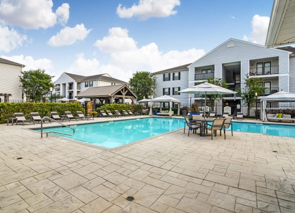 the resort style swimming pool at our apartments at Avalon Apartment Homes, Starkville, MS
