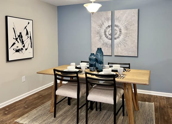 our spacious dining room has a large table for 6 at Reserve at Park Place Apartments, Mississippi 39402