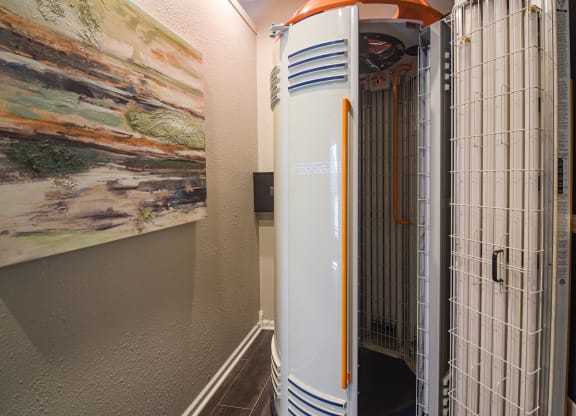 a large heater in a hallway with a painting on the wall at Canebrake Apartment Homes in Shreveport, Louisiana, 71115