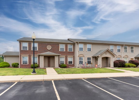 our apartments offer a spacious living area with a paved parking lot