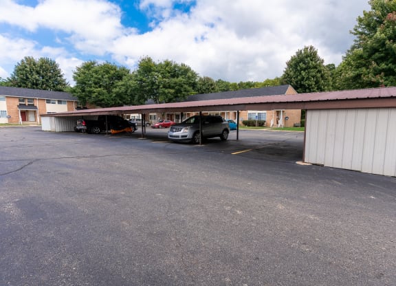 a parking lot with a car in front of a building