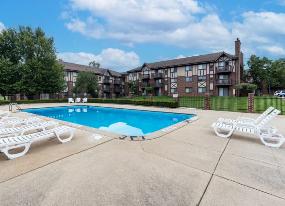 our apartments offer a swimming pool with chaise lounge chairs