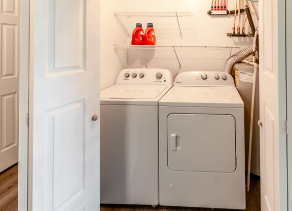 the washer and dryer in the laundry room of a home