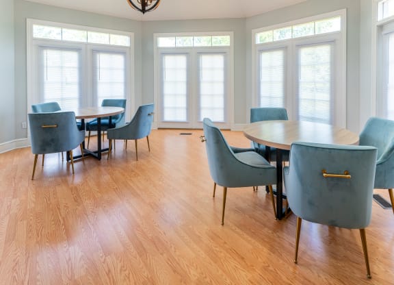 a conference room with a large table and chairs