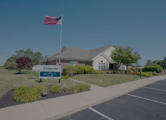 a house with an flag flying in front of it