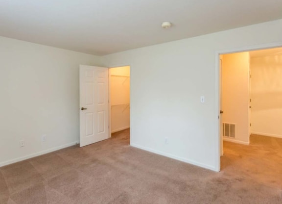 Large bedroom with walk-in closet at Bexley Village, Greenwood, IN