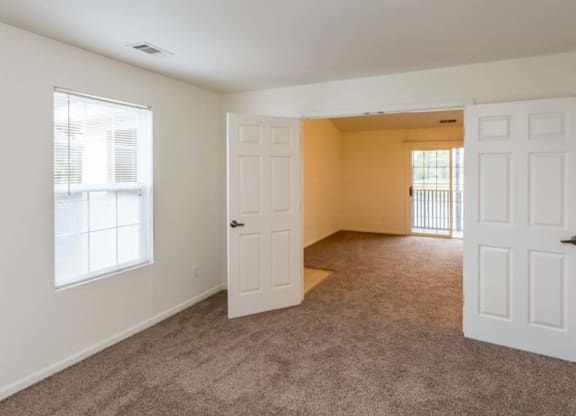Spacious bedroom with French doors at Bexley Village, Indiana, 46143