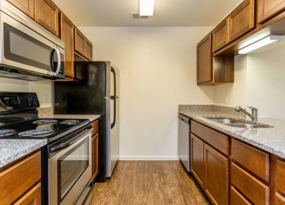 Large updated kitchen with stainless steel appliances at Bexley Village, Greenwood, 46143