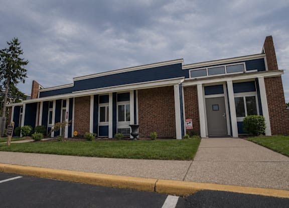 A building with a blue roof and white trim.