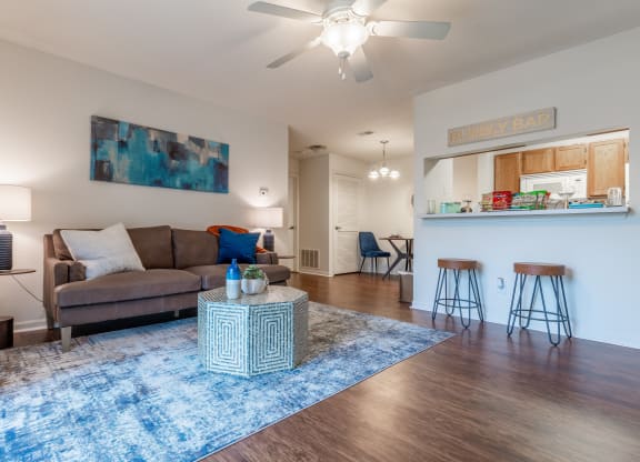Living Room With Kitchen View at Bexley Village, Greenwood, IN, 46143