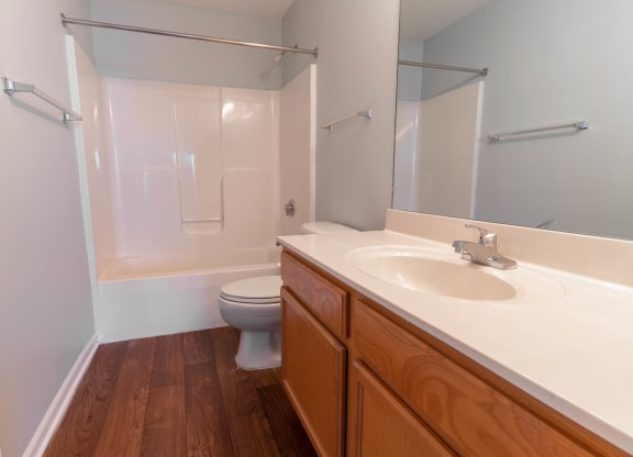 Wood bathroom cabinets at Creekside at Meadowbrook Apartments, Indiana