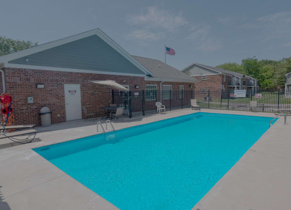our swimming pool is in front of our building at our apartments in the colony
