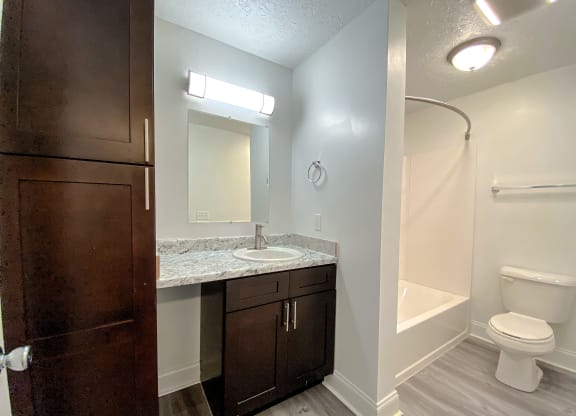 Spacious modern bathroom with storage at Camelot East Apartments, Fairfield, OH, 45014