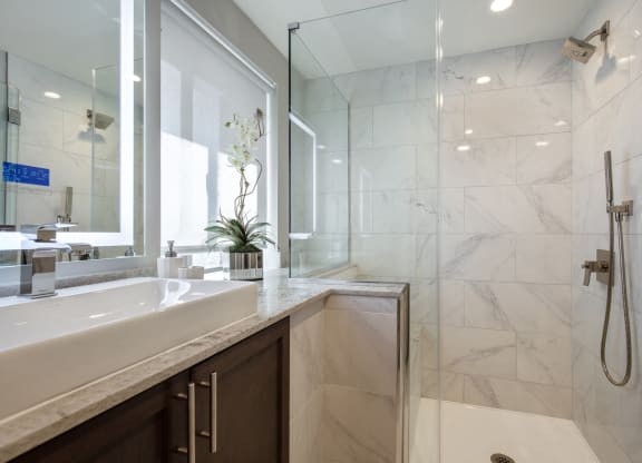 Lever-Style Door and Faucet Handles In Bathroom at Park Heights by the Lake Apartments, Chicago, 60649