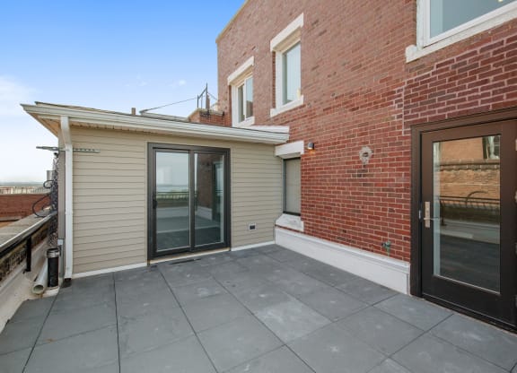 Rooftop Deck With Plenty Of Space To Lounge And Entertain at Park Heights by the Lake Apartments, Illinois