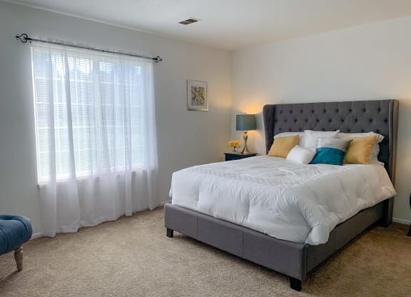 Spacious bedroom with large closet at The Lodge Apartments in Indianapolis, IN