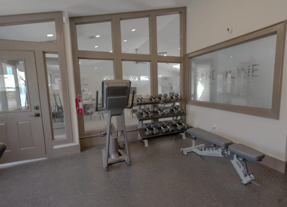 the gym at the flats at big tex apartments