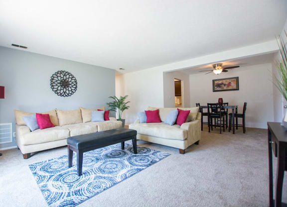 Decorated Living Room With Natural Light at The Lodge Apartments, Indiana