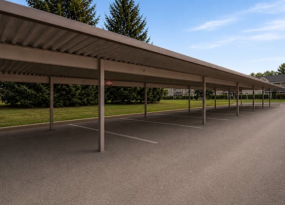 A long row of parking bays under a roof.