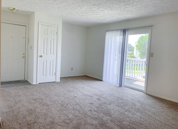 Spacious living room at Waterstone Place Apartments in Indianapolis, IN 46229