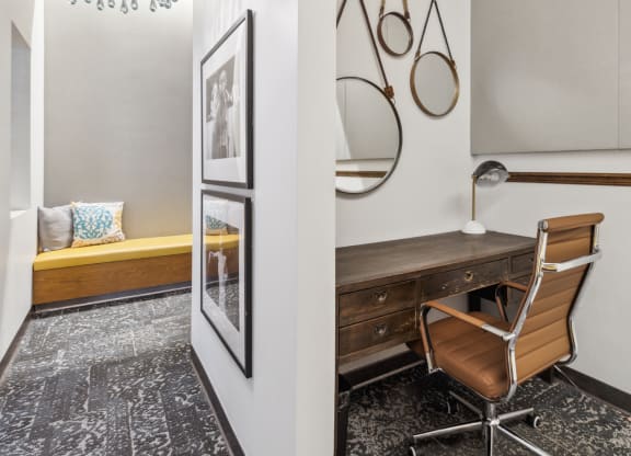 a study area with a desk and a chair and a mirror at Bakery Living, Pittsburgh, PA