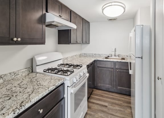 a kitchen with white appliances at Walnut Towers at Frick Park, Pennsylvania 15217